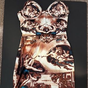 Strapless renaissance oriented dress with corset attached